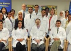 NIAMS Community Health Clinic staff with Dr. Richard Siegel (seated r) NIAMS clinical director and Dr. James Katz (seated c) chief of the NIAMS Rheumatology Fellowship and Training Branch