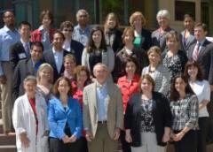 NIAMS Coalition steering committee members and NIAMS senior leadership gather outside of Bldg. 50 during their campus visit.